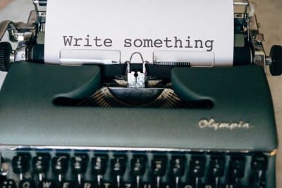 blog writing typewriter